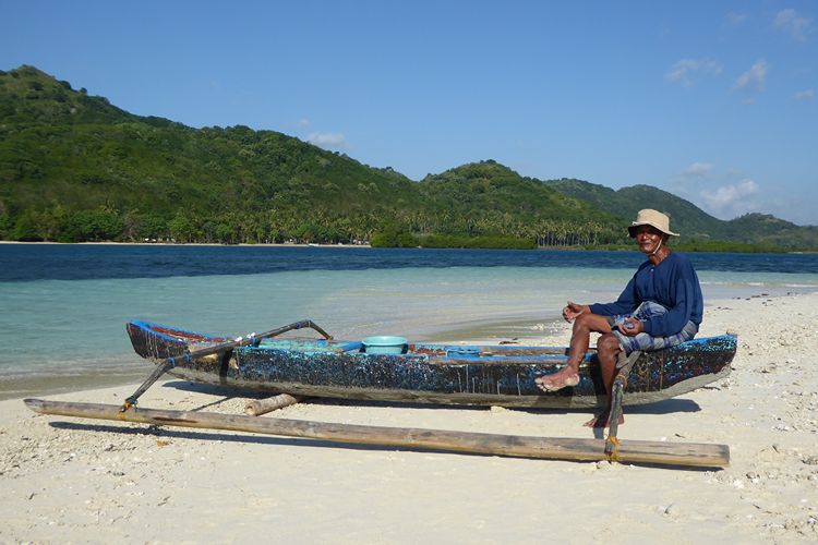 STAR CLIPPER. A fisherman selling shell necklaces on an islet near Gili Sudak in Lombok Indonesia. Picture Angela Saurine